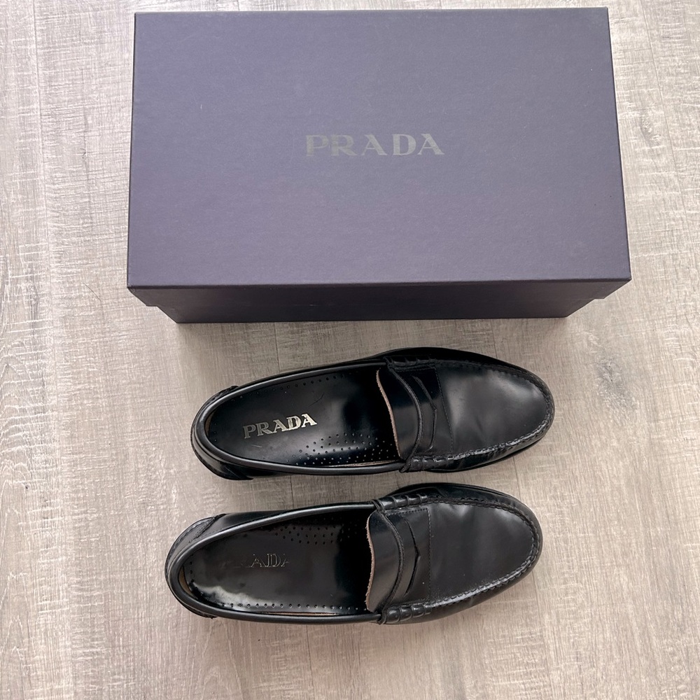 Prada Classic Black Leather Slip-Ons